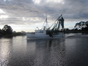 A shrimp boat passing us in the early morning.