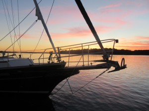 The sun sets over Belle Bateau's bowsprit on Day 41.