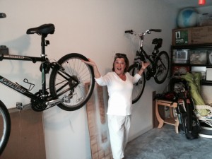 Gail enjoying bikes on the wall of "the office"