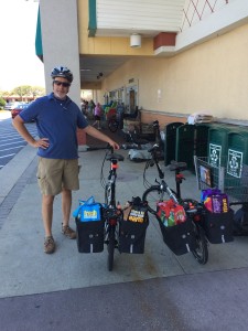 Dudley with our two bikes loaded up with $176 worth of groceries